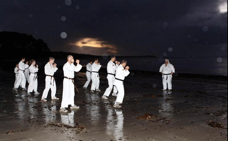 Karate training at the beach